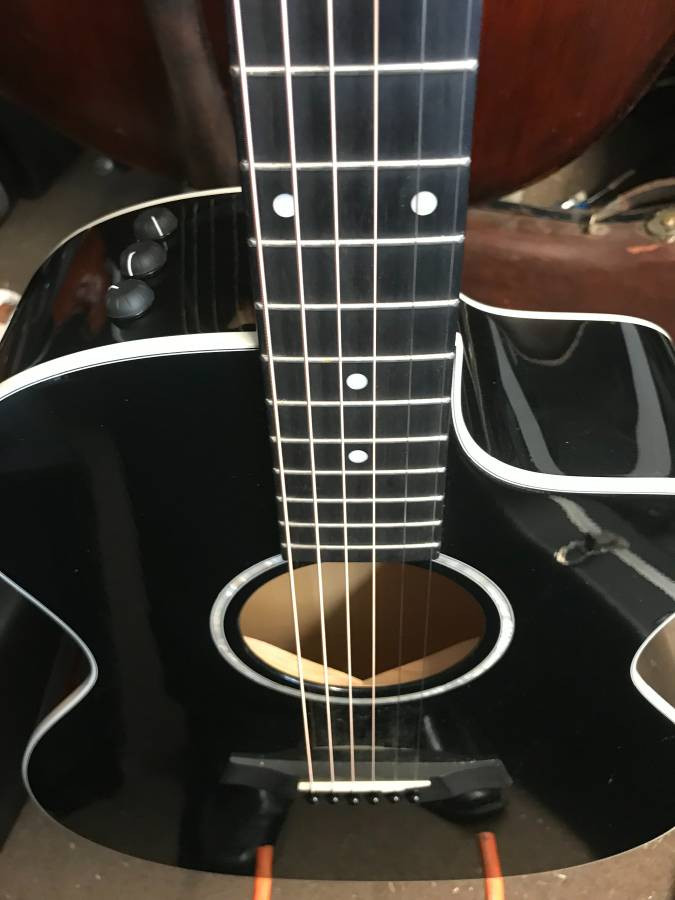 Taylor Acoustic Guitar 214 CE Cutaway Electric SOLD.