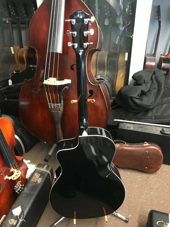 Taylor Acoustic Guitar 214 CE Cutaway Electric SOLD.